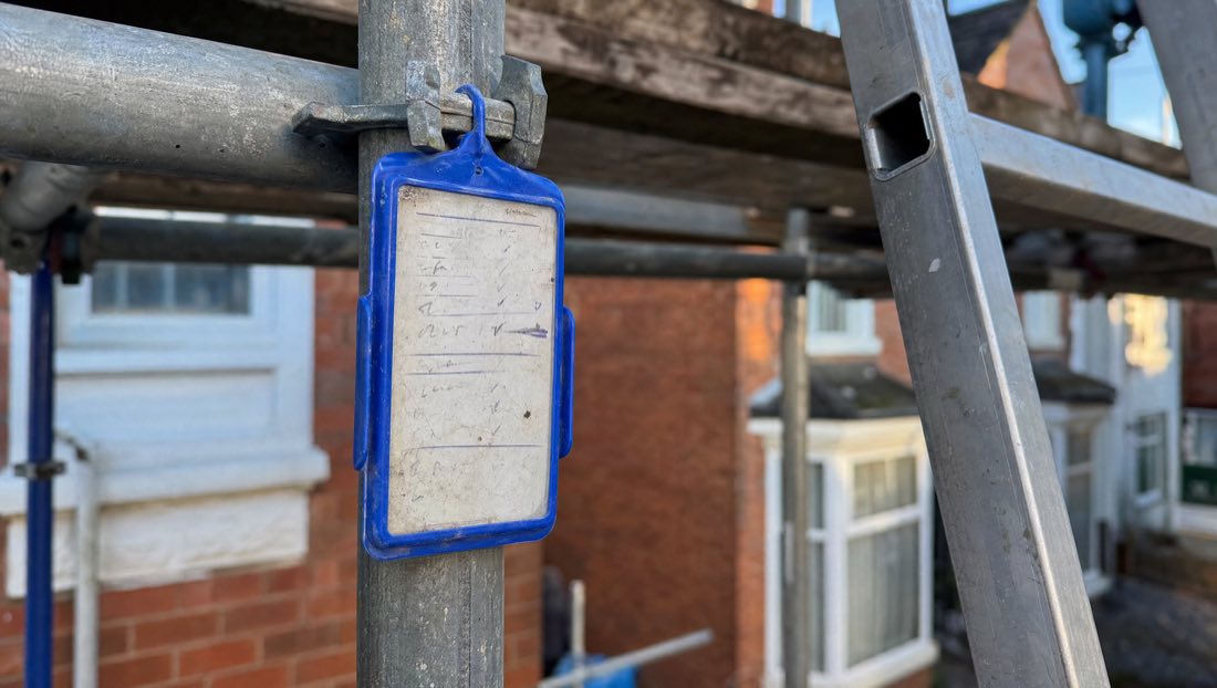 Scaffold inspection tag on a galvanised tube